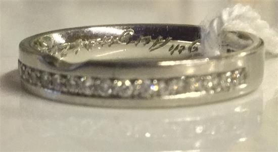 Platinum and diamond half eternity/engagement ring